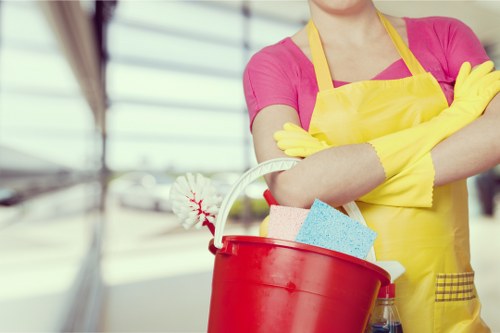 Cleaning a building exterior in Shepherds Bush with careful surface treatment